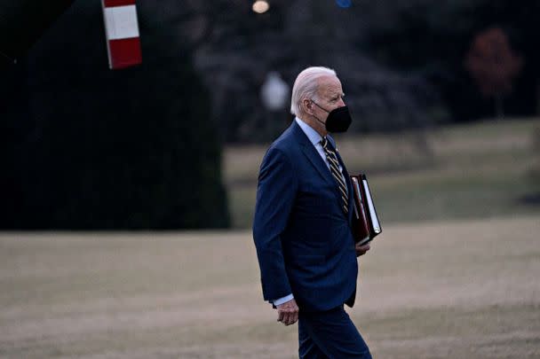 PHOTO: President Joe Biden walks on the South Lawn of the White House following an arrival on Marine One after accompanying First Lady Jill Biden to Walter Reed National Military Medical Center in Washington, DC, Jan. 11, 2023. (Andrew Harrer/Bloomberg via Getty Images)