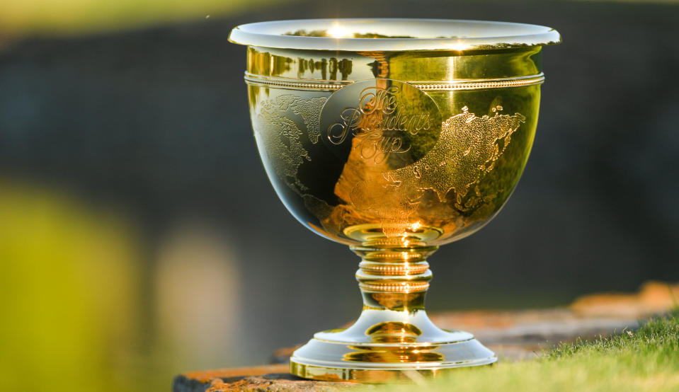 Presidents Cup trophy on green grass