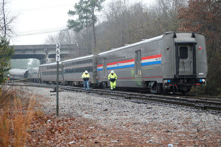 Emergency responders are at the scene after an Amtrak passenger train collided with a freight train and derailed in Cayce, South Carolina, U.S., February 4, 2018. REUTERS/Randall Hill