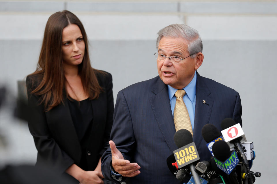 Sen.&nbsp;Bob Menendez speaks to journalists on Tuesday outside United States District Court for the District of New Jersey in Newark, New Jersey, after arriving to face trial for federal corruption charges. His daughter Alicia Menendez looks on. (Photo: Joe Penney / Reuters)