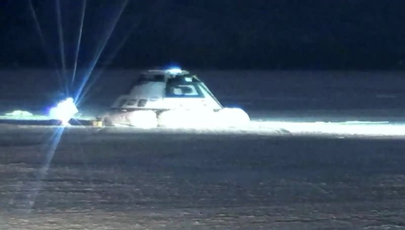 Boeing Starliner space capsule checked after landing at White Sands