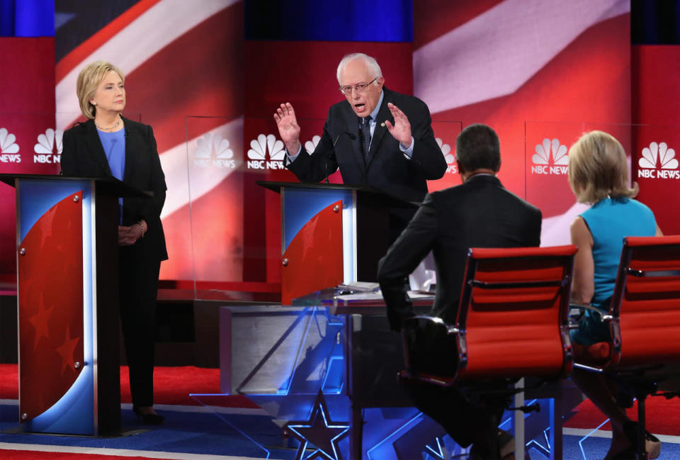 Hillary Clinton and Bernie Sanders field questions from the moderators