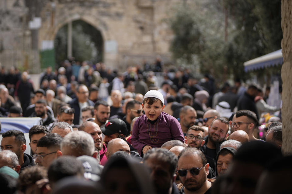 Muslim worshippers leave the Al-Aqsa Mosque compound after Friday prayers during the Muslim holy month of Ramadan in Jerusalem's Old City, Friday, March 15, 2024. (AP Photo/Ohad Zwigenberg)