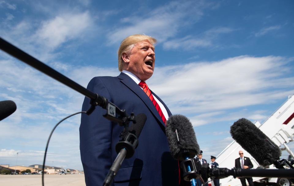 President Donald Trump speaks to the press after arriving on Air Force One at Joint Base Andrews in Maryland, September 26, 2019.