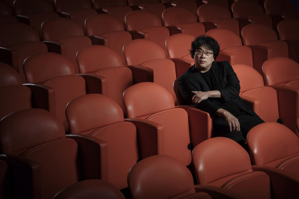 This Oct. 8, 2019 photo shows filmmaker Bong Joon-Ho posing for a portrait at the Whitby Hotel screening room in New York to promote his film "Parasite." (Photo by Christopher Smith/Invision/AP)