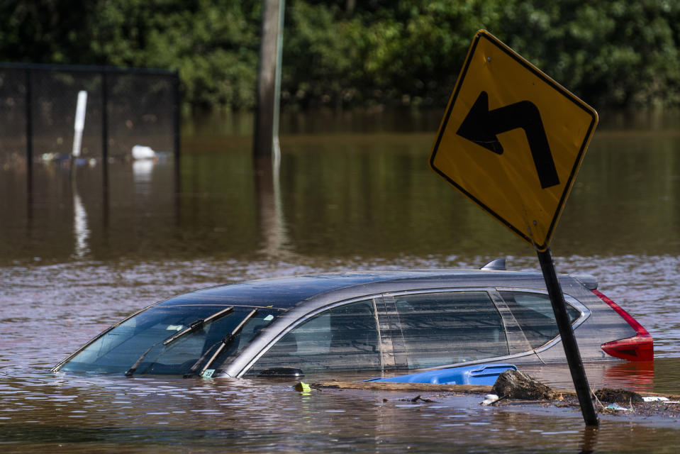A car flooded on a local street as a result of the remnants of Hurricane Ida is seen in Somerville, N.J. Thursday, Sept. 2, 2021. (AP Photo/Eduardo Munoz Alvarez)