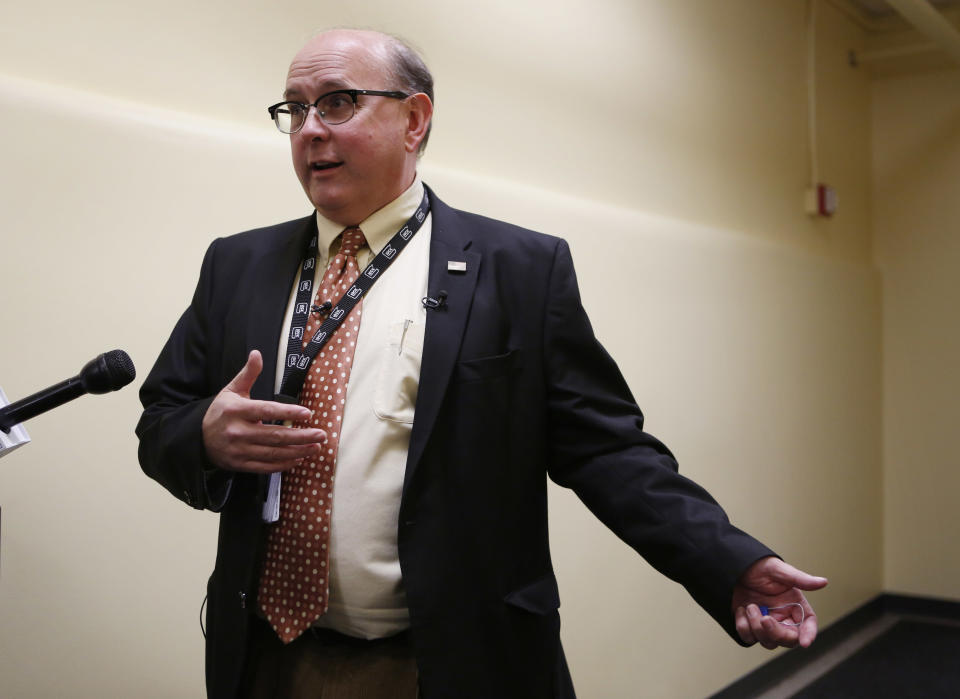 FILE - In this Nov. 12, 2018 file photo, Secretary of State Matthew Dunlap speaks to reporters in Augusta, Maine. Republican U.S. Rep. Bruce Poliquin and three voters sued Tuesday, Nov. 12 over Maine's new voting system, used for the first time in U.S. House and Senate elections. A lawyer for Poliquin's campaign asked the secretary of state to stop the tabulations to allow a judge to rule, but the secretary declined to stop the process. (AP Photo/Robert F. Bukaty)