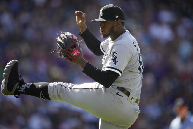 Touki Toussaint of the Chicago White Sox talks with pitching coach