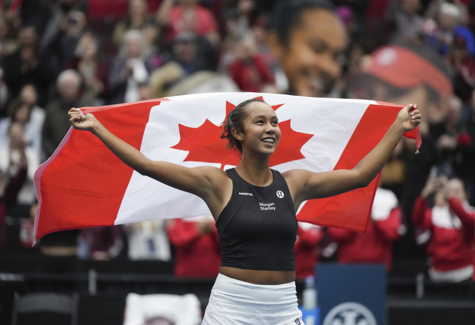 Canada's Leylah Fernandez celebrates after she and Gabriela Dabrowski defeated Belgium's Kirsten Flipkens and Greet Minnen in a doubles match during a Billie Jean King Cup tennis qualifier Saturday, April 15, 2023, in Vancouver, British Columbia. (Darryl Dyck/The Canadian Press via AP)
