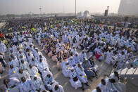 Nuns and priests attend a Holy Mass led by Pope Francis at the John Garang Mausoleum in Juba, South Sudan Sunday, Feb. 5, 2023. Pope Francis is in South Sudan on the final day of a six-day trip that started in Congo, hoping to bring comfort and encouragement to two countries that have been riven by poverty, conflicts and what he calls a "colonialist mentality" that has exploited Africa for centuries. (AP Photo/Ben Curtis)