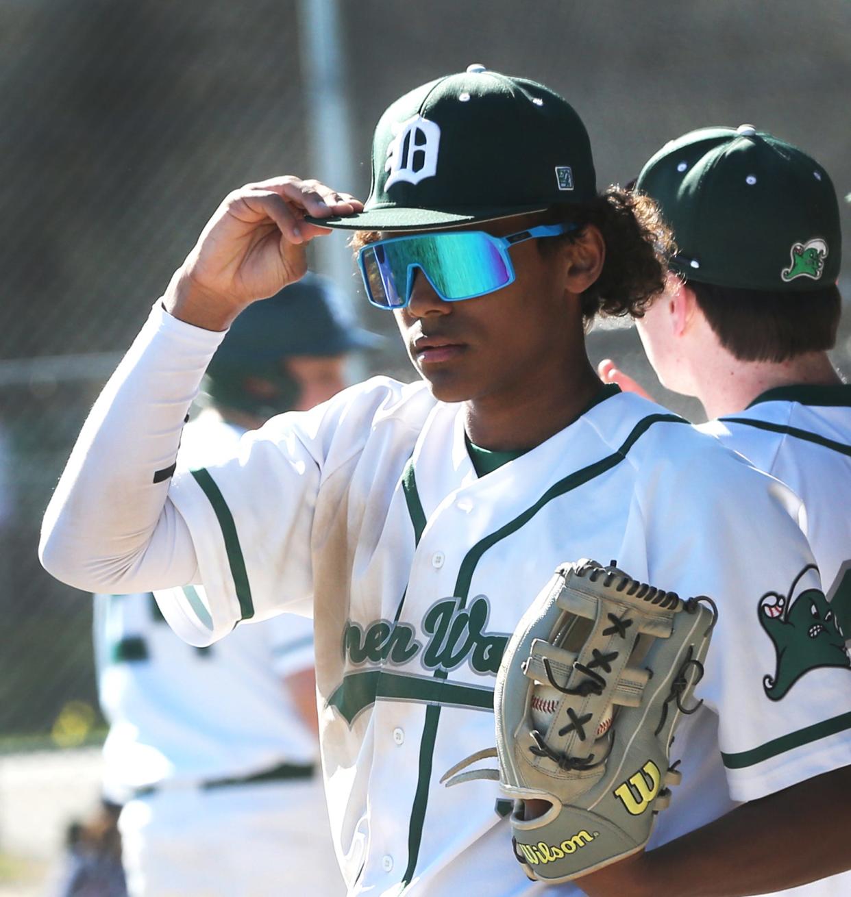 Dover High School freshman center fielder Amari Lewis is shining in the field, at the plate and on the basepaths this season for the Green Wave.