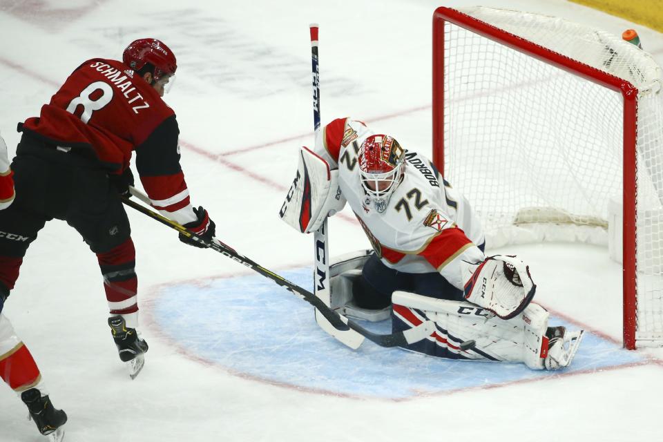 Florida Panthers goaltender Sergei Bobrovsky (72) makes a save on a shot by Arizona Coyotes center Nick Schmaltz (8) during the first period of an NHL hockey game Tuesday, Feb. 25, 2020, in Glendale, Ariz. (AP Photo/Ross D. Franklin)