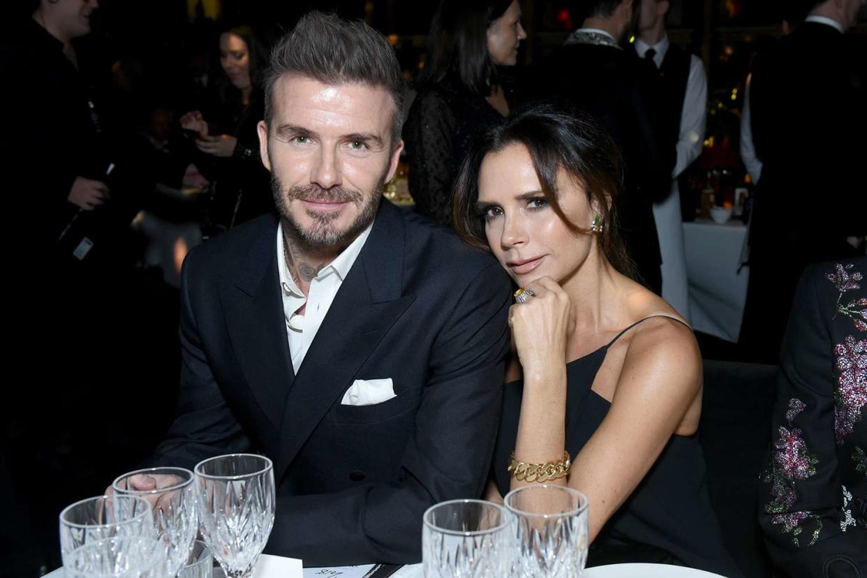 <p>Joe Maher/BFC/Getty Images</p> David and Victoria Beckham at the British Fashion Awards in 2018