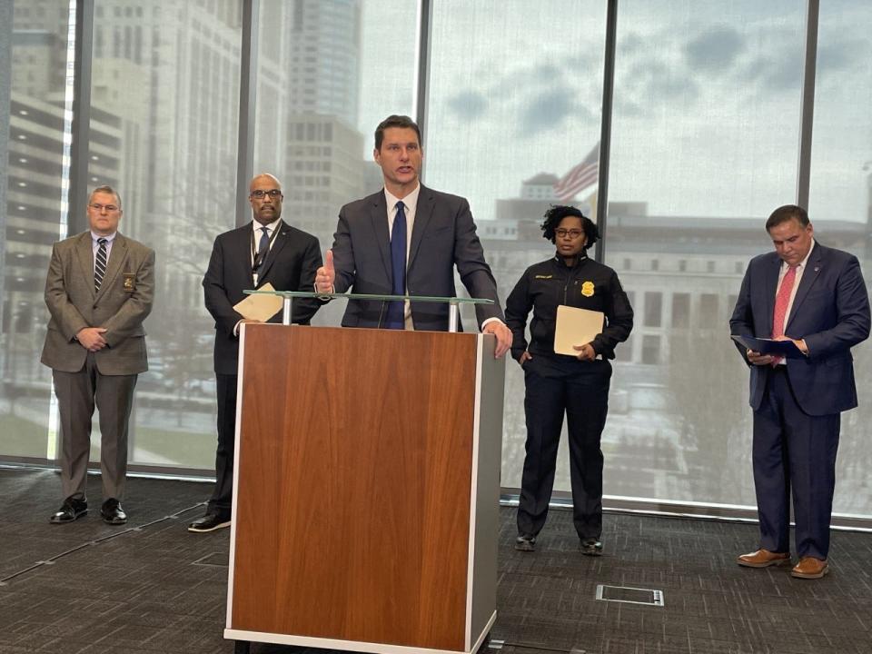 City Attorney Zach Klein speaks Tuesday about the release of a Department of Justice report after a year-and-a-half long review of the Division of Police.