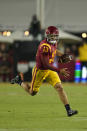 FILE - Southern California quarterback Caleb Williams (13) runs during the second half of an NCAA college football game against Washington State Saturday, Oct. 8, 2022, in Los Angeles. Heisman Trophy winner Caleb Williams was one of three Southern California players to be selected to The Associated Press All-America team released Monday, Dec. 12, 2022. (AP Photo/Marcio Jose Sanchez, File)