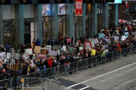 People line Broadway during the Earth Day 'March For Science NYC' demonstration to coincide with similar marches globally in Manhattan, New York, U.S., April 22, 2017. REUTERS/Andrew Kelly