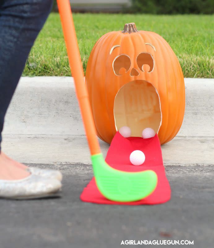 <p>First one to make a hole in one wins everyone's Halloween candy! (Just kidding.)</p><p><em><a href="http://www.agirlandagluegun.com/2016/09/pumpkin-golf.html" rel="nofollow noopener" target="_blank" data-ylk="slk:Get the tutorial at a Girl and a Glue Gun »;elm:context_link;itc:0;sec:content-canvas" class="link ">Get the tutorial at a Girl and a Glue Gun »</a></em> </p>