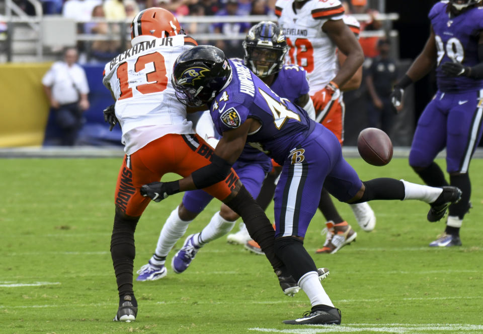 Cleveland Browns wide receiver Odell Beckham (13) is hit by Baltimore Ravens cornerback Marlon Humphrey (44) on Sunday. (Getty Images)