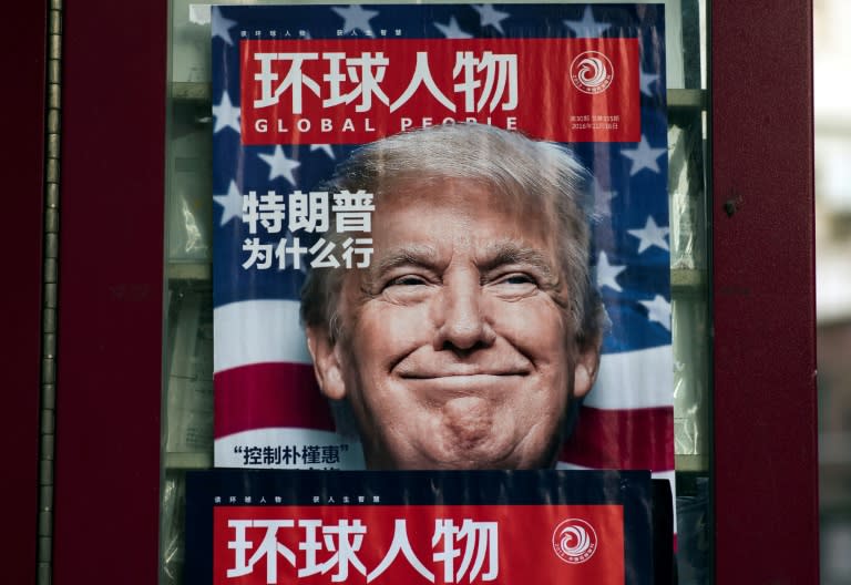 US President-elect Donald Trump features on a magazine front cover on a Shanghai news stand, on December 14, 2016