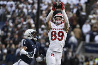 Rutgers tight end Victor Konopka (89) catches a pass as Penn State safety Jaquan Brisker (1) defends during an NCAA college football game in State College, Pa., Saturday, Nov. 20, 2021. Penn State won 28-0. (AP Photo/Barry Reeger)