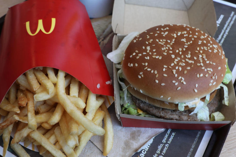 McDonald's meal with fries and a Big Mac burger in open packaging