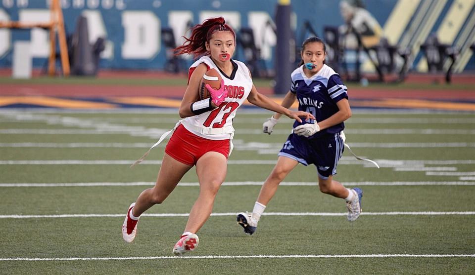 Julianna Sarabia of Verdugo Hills scores a touchdown in the first half of Saturday's City Division I flag football final.