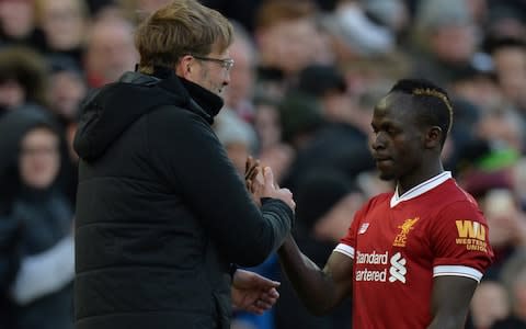 Jurgen Klopp congratulates Sadio Mane - Credit: REUTERS