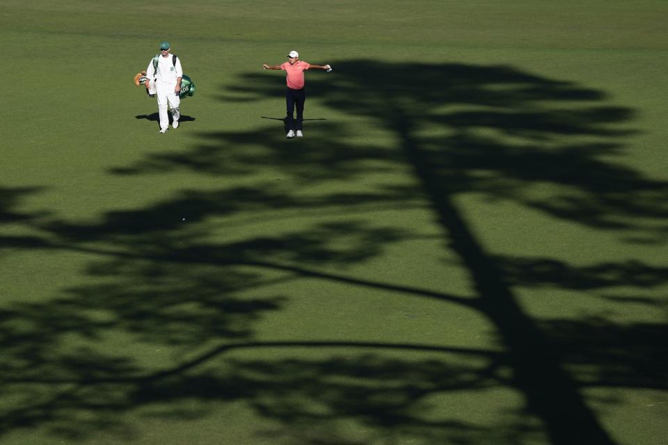 Collin Morikawa walks to the green on the 15th hole during third round at the Masters golf tournament at Augusta National Golf Club Saturday, April 13, 2024, in Augusta, Ga. (AP Photo/David J. Phillip)