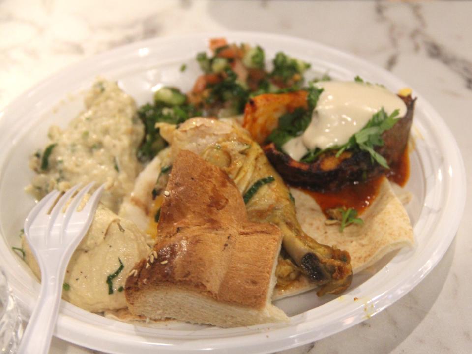 A plate of food at Ayat's free Shabbat dinner.
