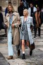 <p>Elsa Hosk manages to make a skirt suit and plaid coat feel all grown up and we love the idea of wearing this to work all winter—but maybe swap in some wool tights.</p>