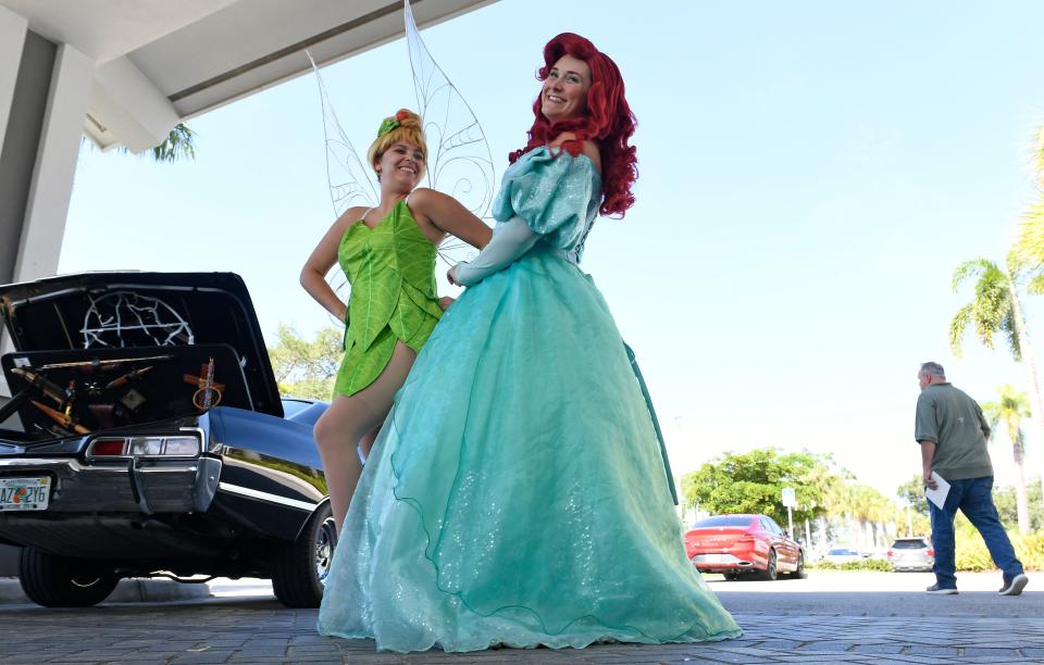 Two cosplayers as Disney characters Tinkerbell and Ariel at SarasotaCon in Sarasota, Florida in 2022.