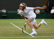 Tennis - Wimbledon - All England Lawn Tennis and Croquet Club, London, Britain - July 9, 2018 Greece's Stefanos Tsitsipas in action during the fourth round match against John Isner of the U.S. REUTERS/Tony O'Brien