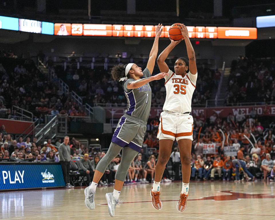 Texas Longhorns guard Madison Booker (35) shoots over Kansas State guard Zyanna Walker (1) during the basketball game at the Moody Center on Sunday, Feb. 4, 2024 in Austin.