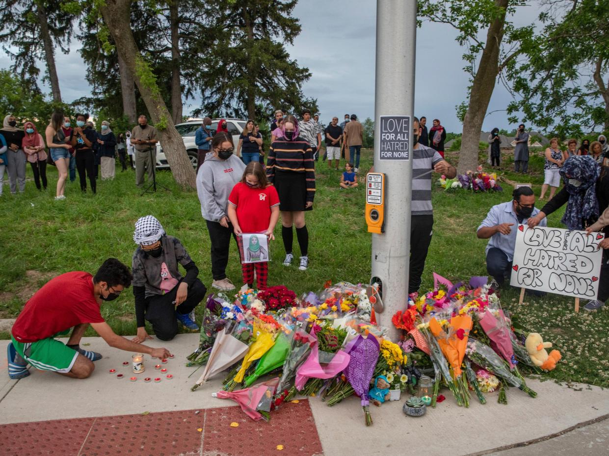 <p>Four members of a Muslim family were killed in a ‘premeditated’ truck attack in Canada, police say</p> (Brett Gundlock/The Canadian Press via AP)
