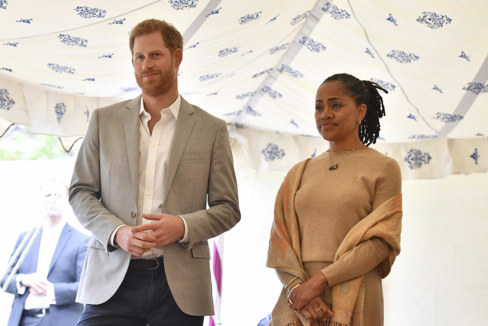 Photo by: KGC-375/STAR MAX/IPx 2018 9/20/18 Great Britain's Prince Harry The Duke of Sussex, Meghan The Duchess of Sussex and Meghan's mother Doria Ragland attend the launch of a cookbook with recipes from a group of women affected by the Grenfell Tower Fire of June 2017. (Kensington Palace, London, England, UK)