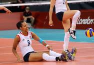 Team Britain's Rachel Bragg on the ground during their Women's Preliminary Round match against Algeria at the London 2012 Olympic Games Volleyball competition, London, Britain, 30 July 2012. EPA/ROBERT GHEMENT EPA/ROBERT GHEMENT