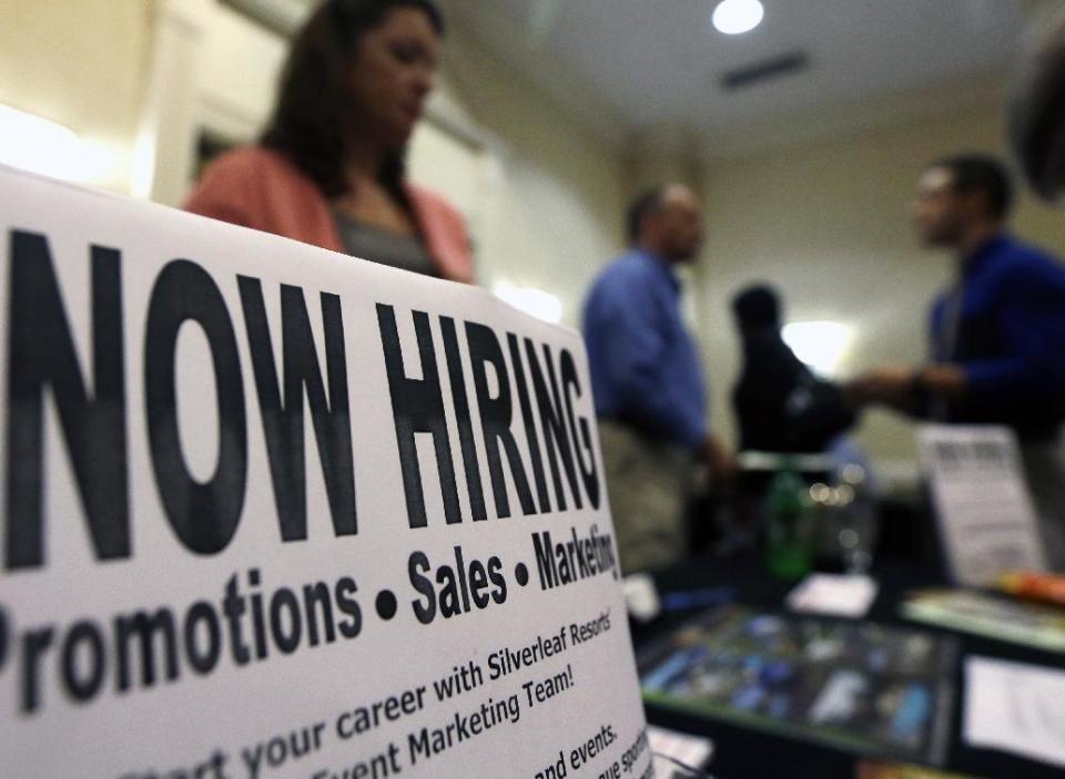 In this Thursday, Oct. 25, 2012, photo, a sign attracts job-seekers during a job fair at the Marriott Hotel in Colonie, N.Y. According to government reports released Friday, Nov. 2, 2012, the U.S. economy added 171,000 jobs in October, and the unemployment rate ticked up to 7.9 percent. (AP Photo/Mike Groll)