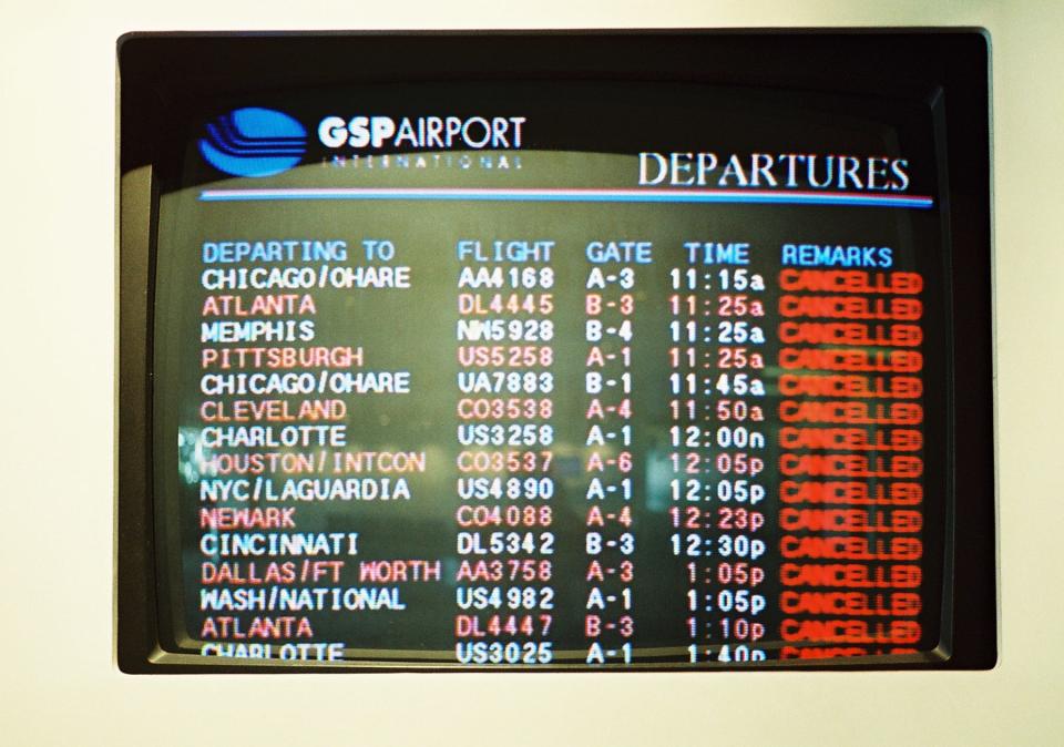 A monitor reads all flights cancelled departing Greenville-Spartanburg International Airport on September 12, 2001.   Airplanes were grounded around the country. 