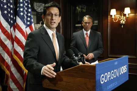 U.S. House Majority Leader Eric Cantor (R-VA) (L-R) and House Speaker John Boehner (R-OH) hold a news conference after a Republican Party caucus meeting on Capitol Hill in Washington May 20, 2014. REUTERS/Jonathan Ernst