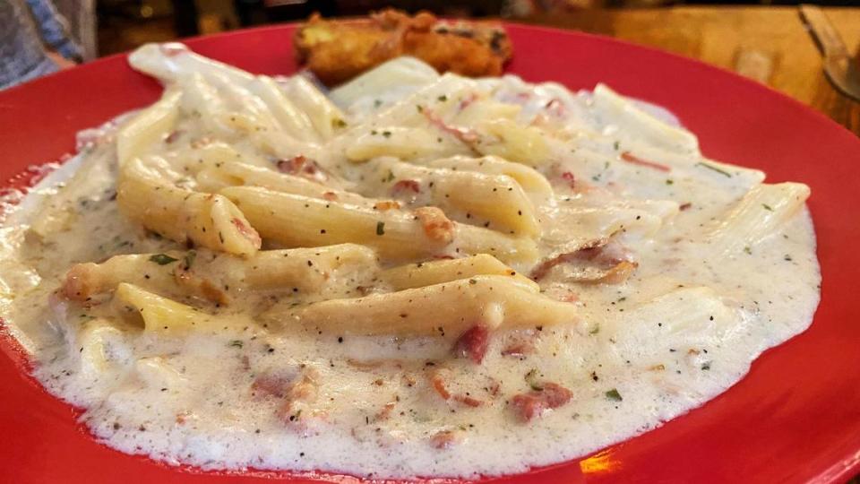 Penne Carbonara at Paisano’s Italian Restaurant & Lounge is cooked with bacon and a three-cheese cream sauce.