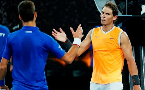 Novak Djokovic is congratulated by Rafael Nadal - Credit: afp