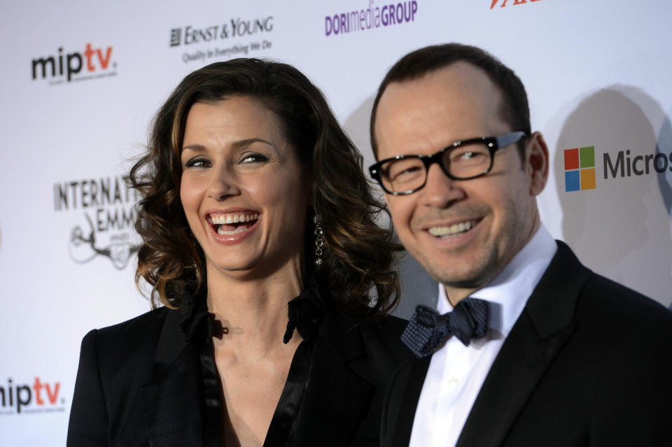 Bridget Moynihan, left, and Donnie Wahlberg of the CBS series "Blue Bloods," arrive for the 40th International Emmy Awards, Monday, Nov. 19, 2012 in New York. (AP Photo/Henny Ray Abrams)