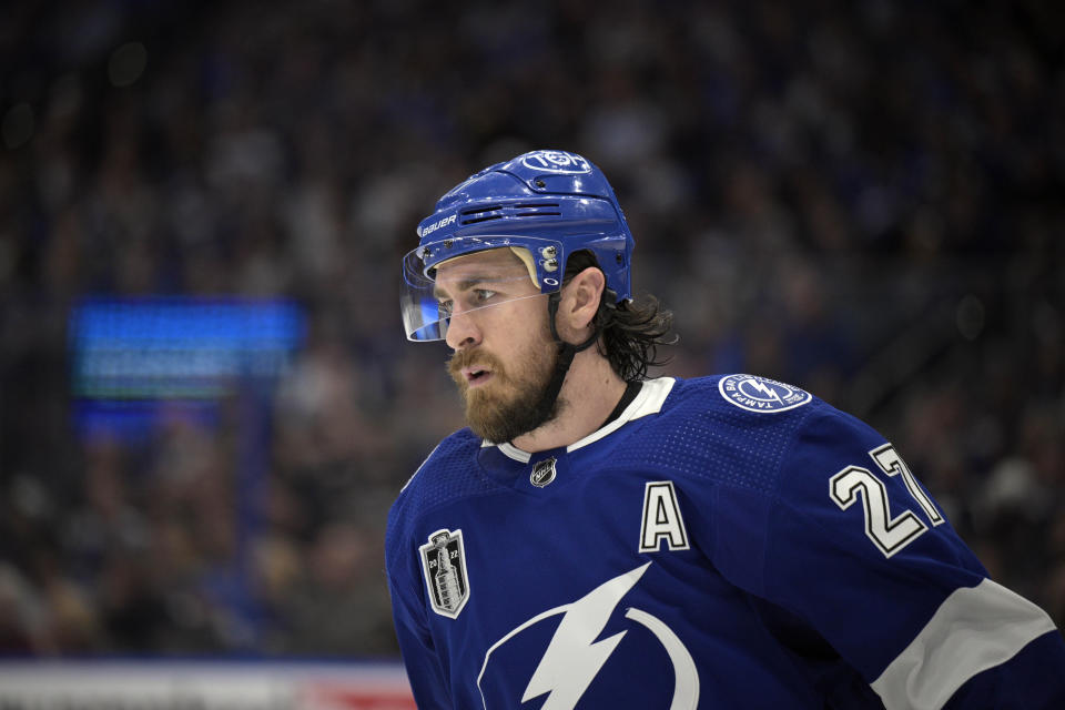 Tampa Bay Lightning defenseman Ryan McDonagh skates on the ice during the overtime period of Game 4 of the NHL hockey Stanley Cup Finals against the Colorado Avalanche, June 22, 2022, in Tampa, Fla. The Lightning have traded McDonagh to the Nashville Predators. They received defenseman Philippe Myers and forward prospect Grant Mismash in the deal. The move clears significant salary cap space for the Lightning to make other moves this offseason. (AP Photo/Phelan M. Ebenhack)