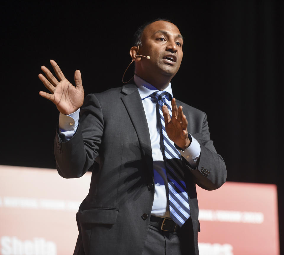 In this Saturday, Jan. 25, 2020, photo, Thiru Vignarajah answers a question during a Baltimore City Mayoral Candidate Forum, hosted by the Greater Baltimore Urban League, at Morgan State University, in Baltimore. (Ulysses Muñoz/The Baltimore Sun via AP)