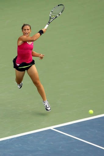 Sara Errani of Italy returns a shot during her women's singles semifinal match against Serena Williams at the 2012 US Open on September 7, 2012 in New York City