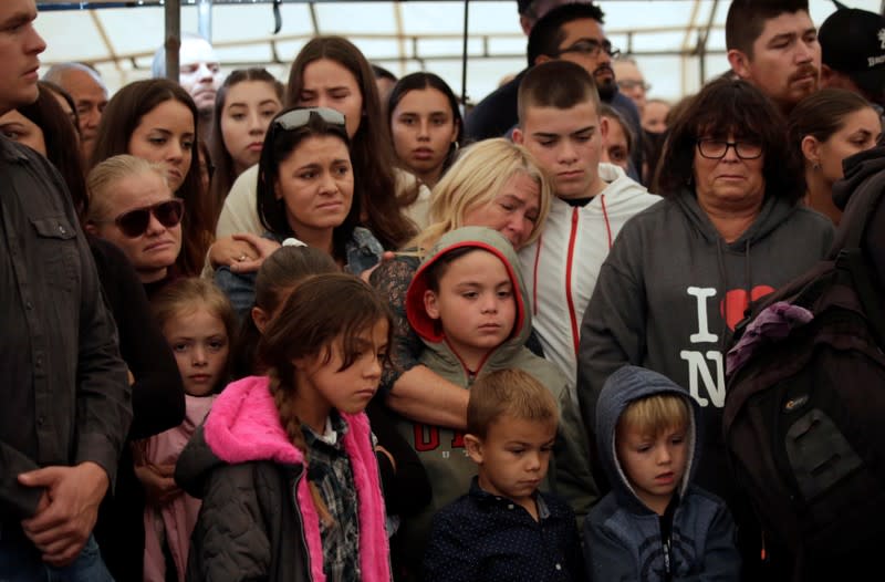 Relatives react during the funeral of Miller and her children who were killed by unknown assailants in LeBaron