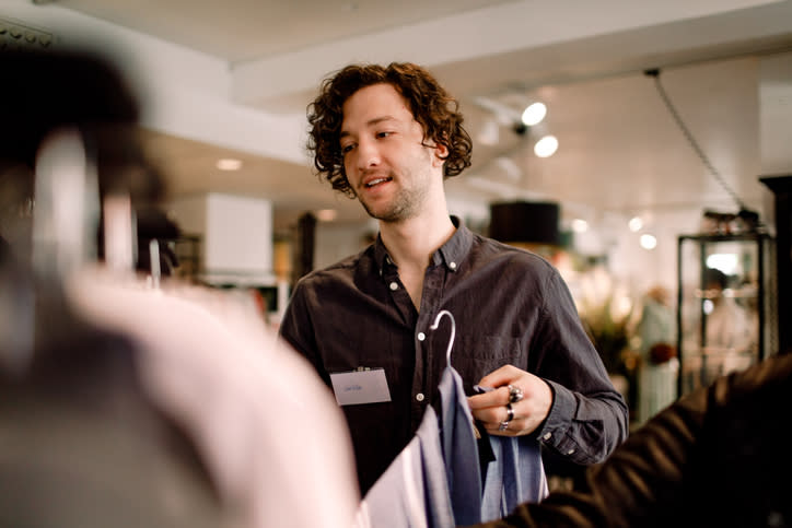 A man working in a retail establishment