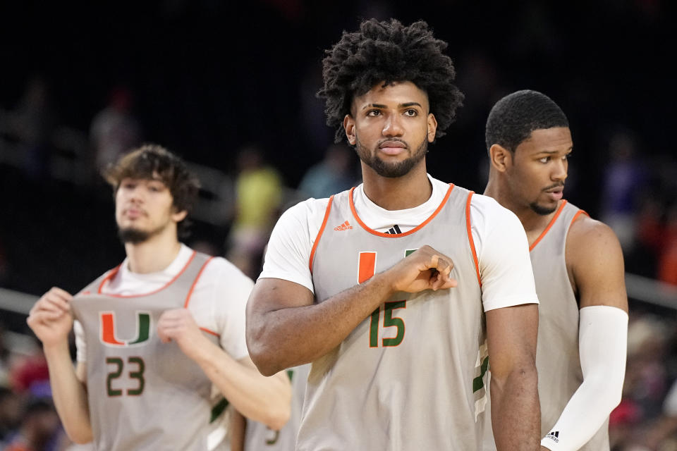 Miami forward Norchad Omier gestures during practice for their Final Four college basketball game in the NCAA Tournament on Friday, March 31, 2023, in Houston. Connecticut and Miami play on Saturday. (AP Photo/Brynn Anderson)
