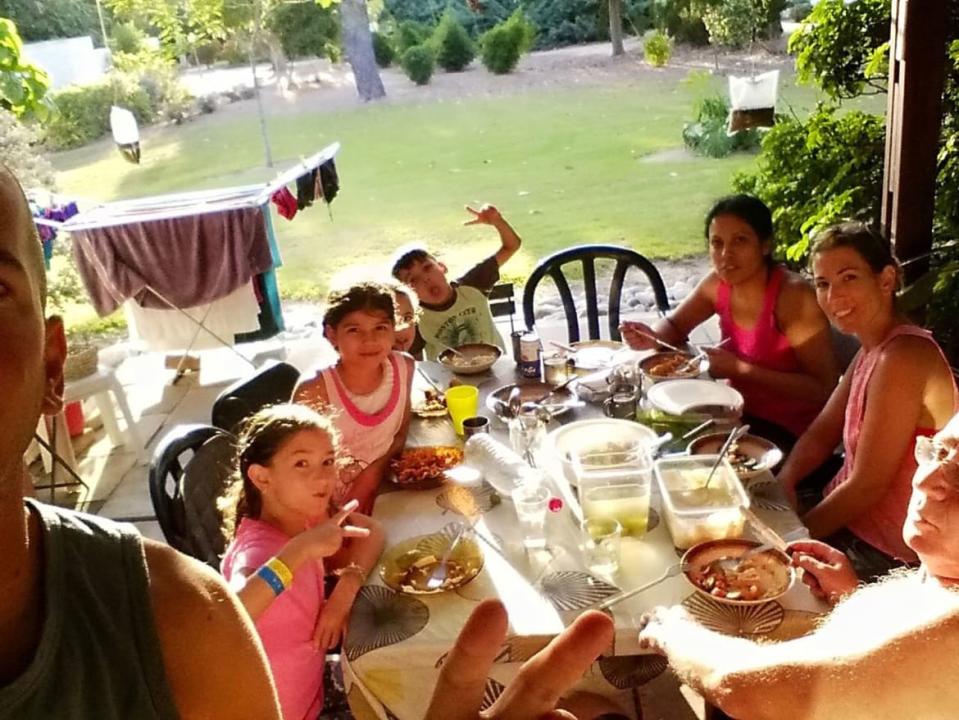 <div class="inline-image__caption"><p>Yospe clan enjoying lunch on grandpa Shalom's beloved porch</p></div> <div class="inline-image__credit">Courtesy of Yospe Family</div>