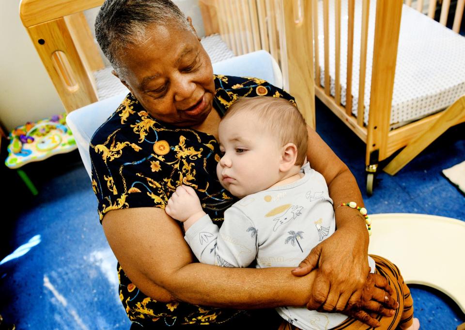 Gloria ‘GG’ Molton rocks Finch Hall to sleep at the Arc Caddo-Bossier Goldman School at The Highland Center Wednesday morning, February 7, 2024.